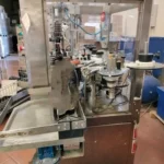 OMB capsuling machine with labeller photo 1