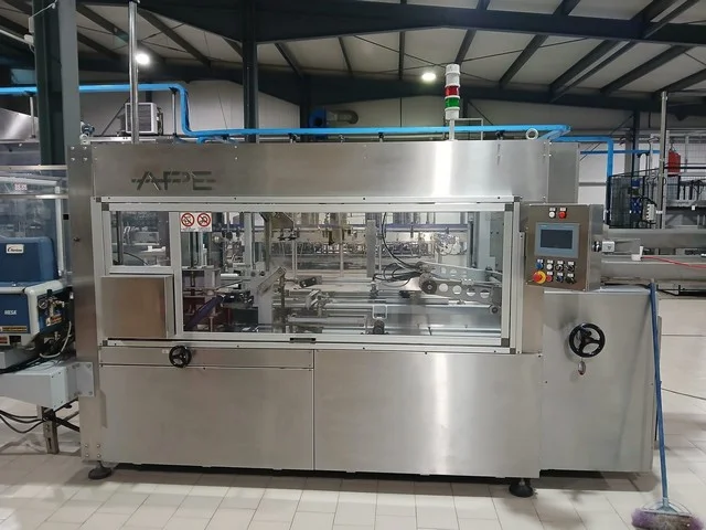 Formatrice scatole con chiusura a caldo Nordson Ape usata