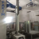 Sacmi palletizer with semi-automatic pallet wrapper photo 3